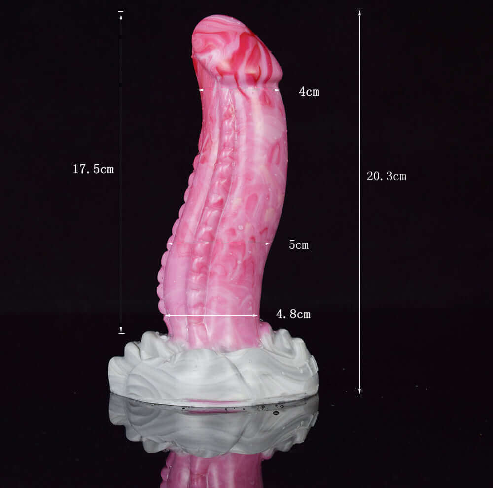Colorful pink dragon dildo with a spiked base and smooth shaft, perfect for adventurous play.