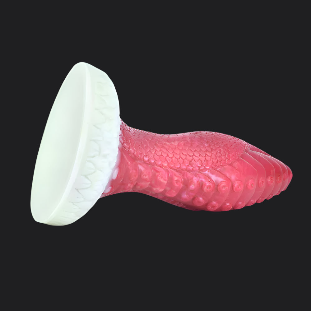 Touka Tentacle Monster, a playful dragon dildo with textured ridges and suction discs.