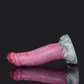 Colorful pink dragon dildo with a spiked base and smooth shaft, perfect for adventurous play.