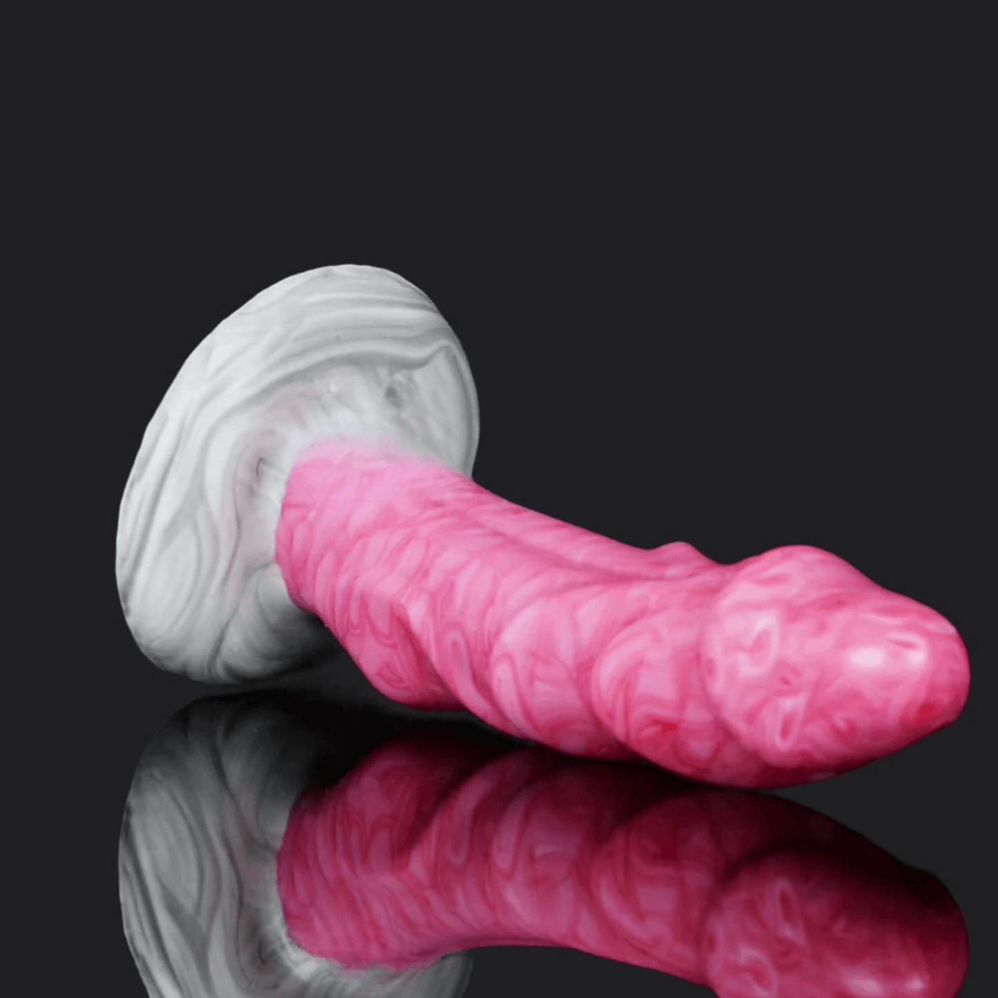 Dragon Dildo Scylla in pink and gray, showcasing its pointed head and flared shaft design.