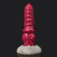Colorful dragon dildo design in pink and purple, featuring a unique shape and textured base for enhanced pleasure.