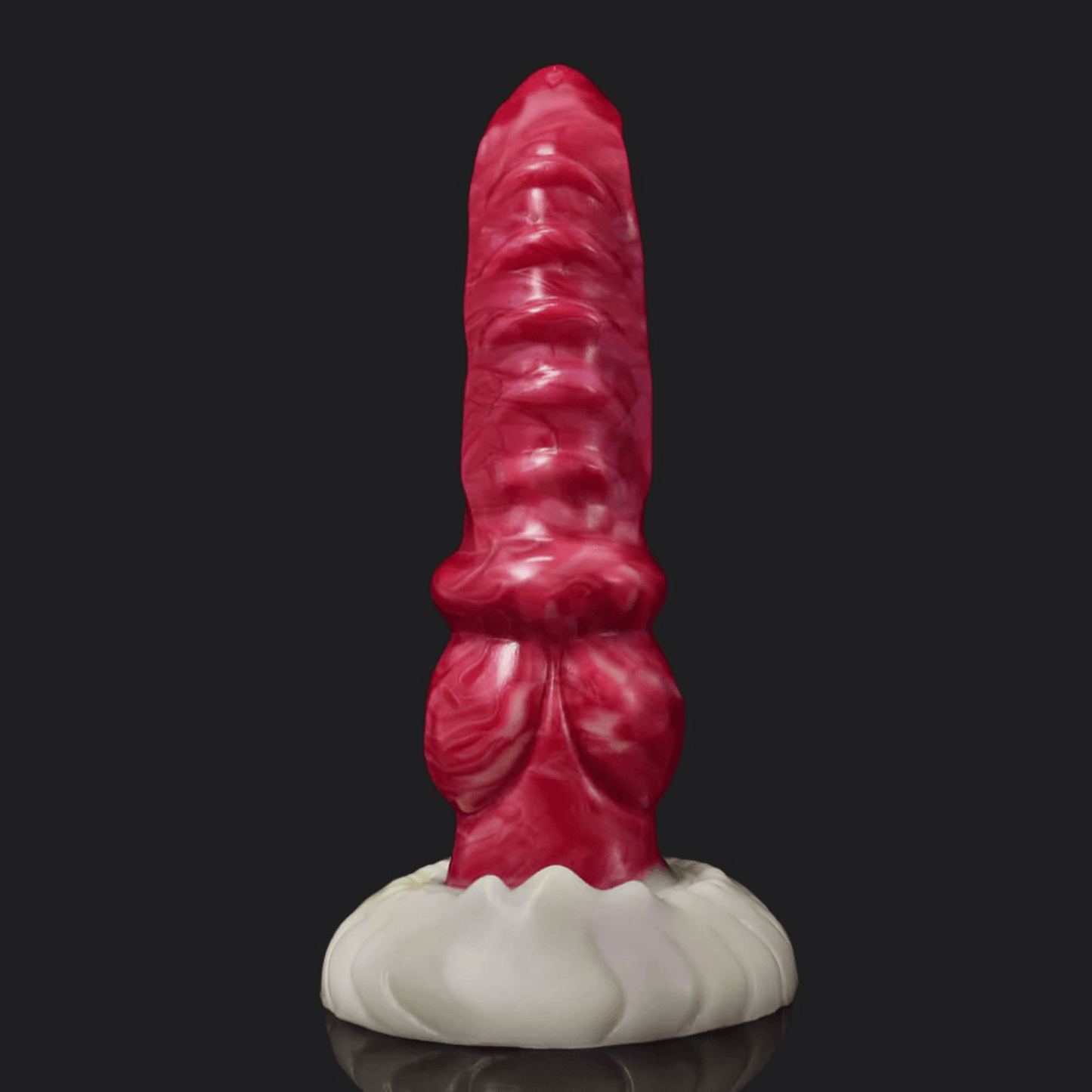 Colorful dragon dildo design in pink and purple, featuring a unique shape and textured base for enhanced pleasure.