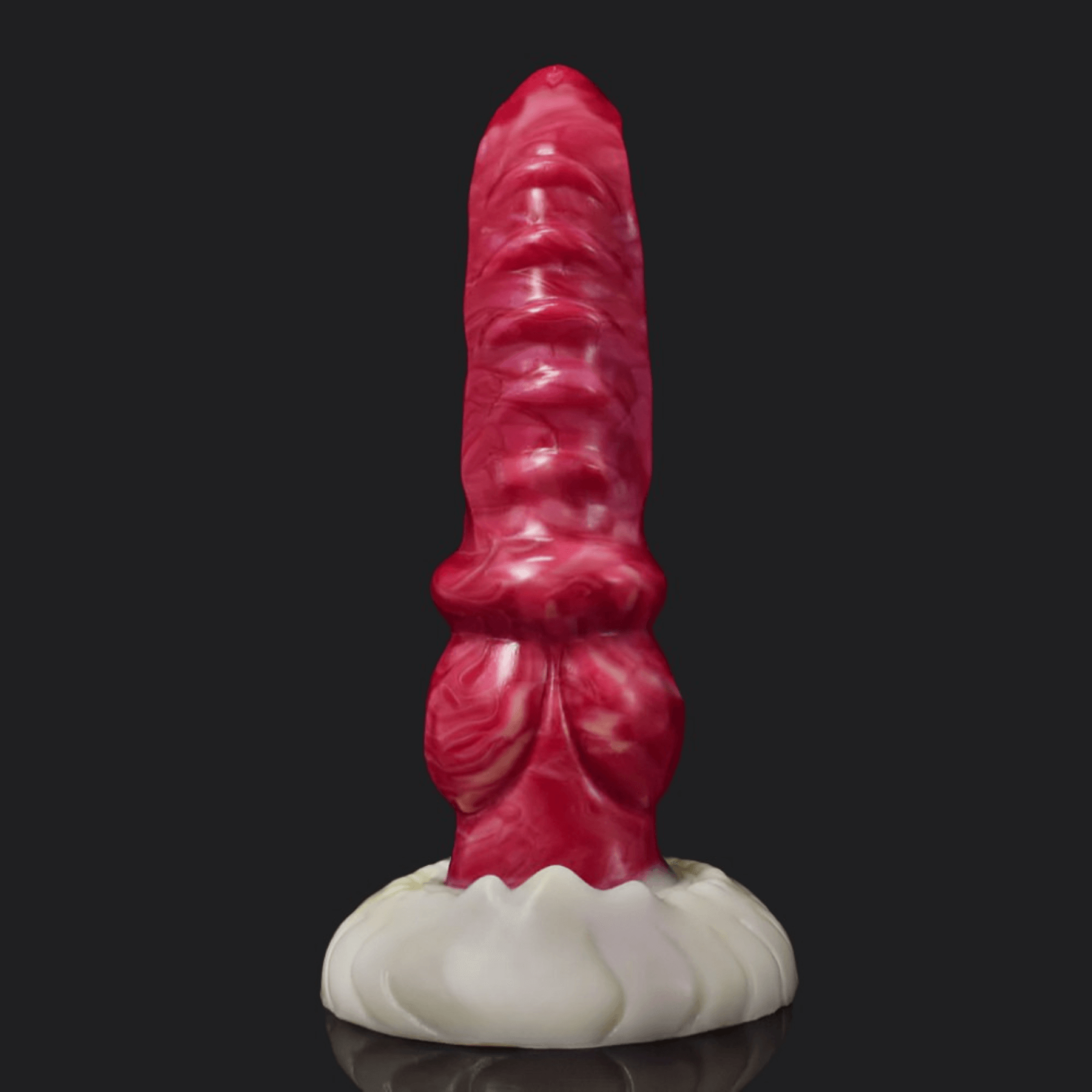 Colorful dragon dildo design in pink and purple, featuring a unique shape and textured base for enhanced pleasure.
