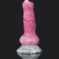 Colorful pink dragon dildo with a tapered head and large base, designed for ultimate pleasure.