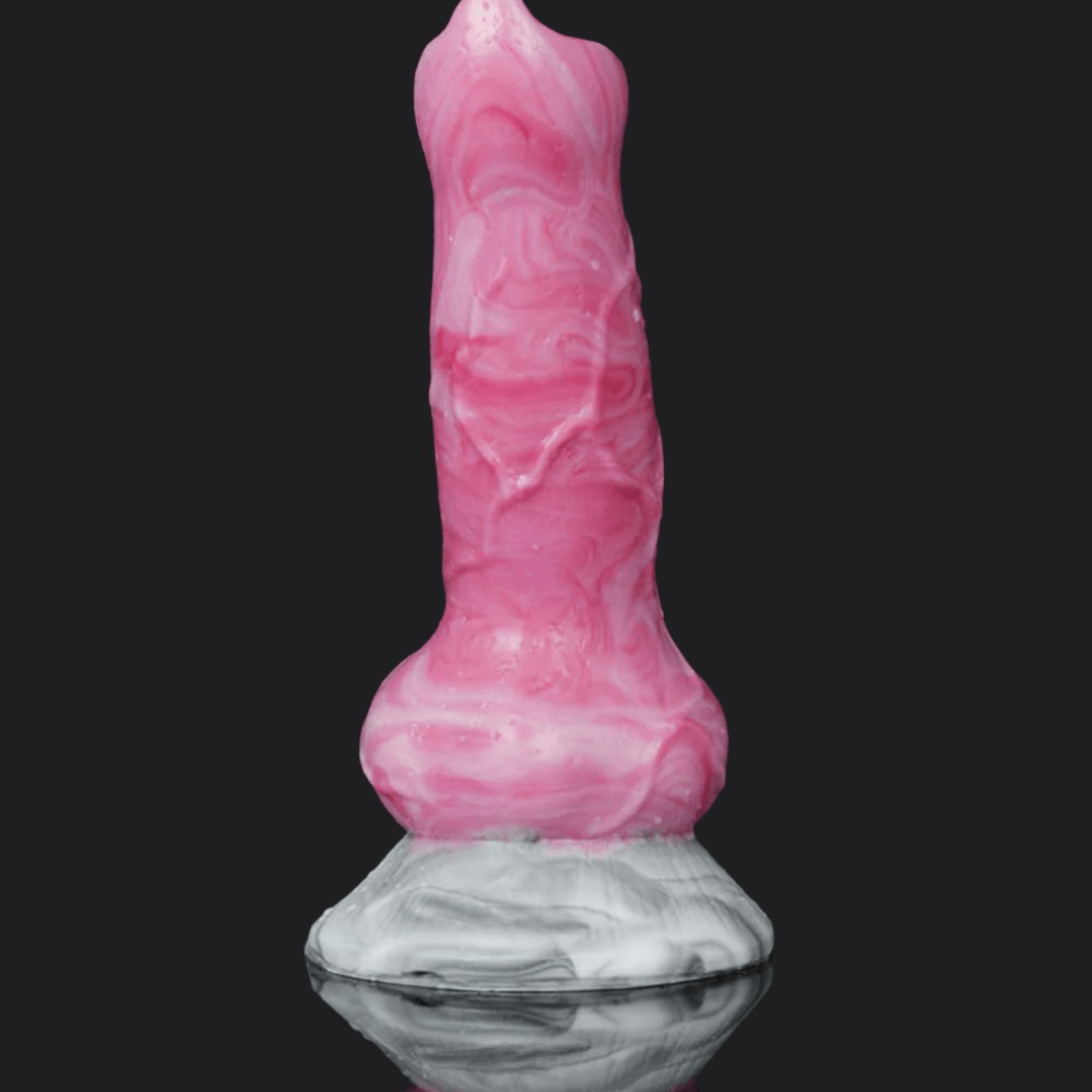 Colorful pink dragon dildo with a tapered head and large base, designed for ultimate pleasure.