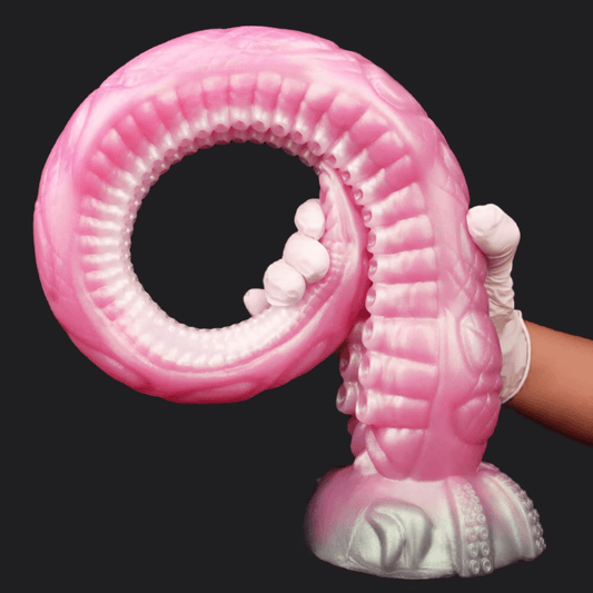 Octopus Elder Tentacle Dildo in pink, featuring suction base and flexible design for enhanced pleasure. Ideal for adventurous journeys.