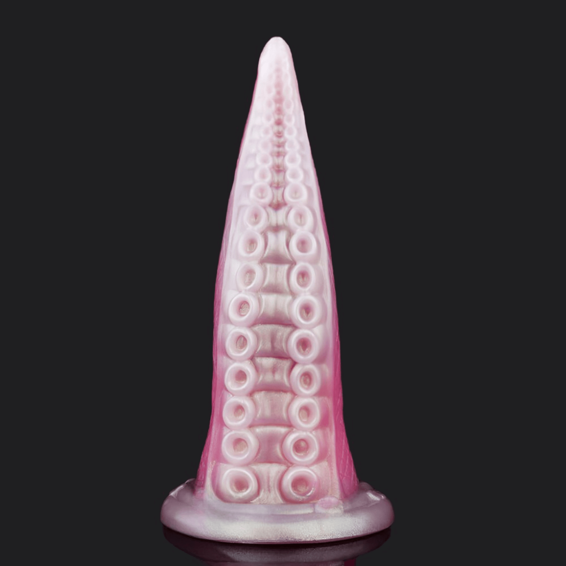 Pink octopus tentacle dildo with suction base for wild fantasies and blended orgasms.