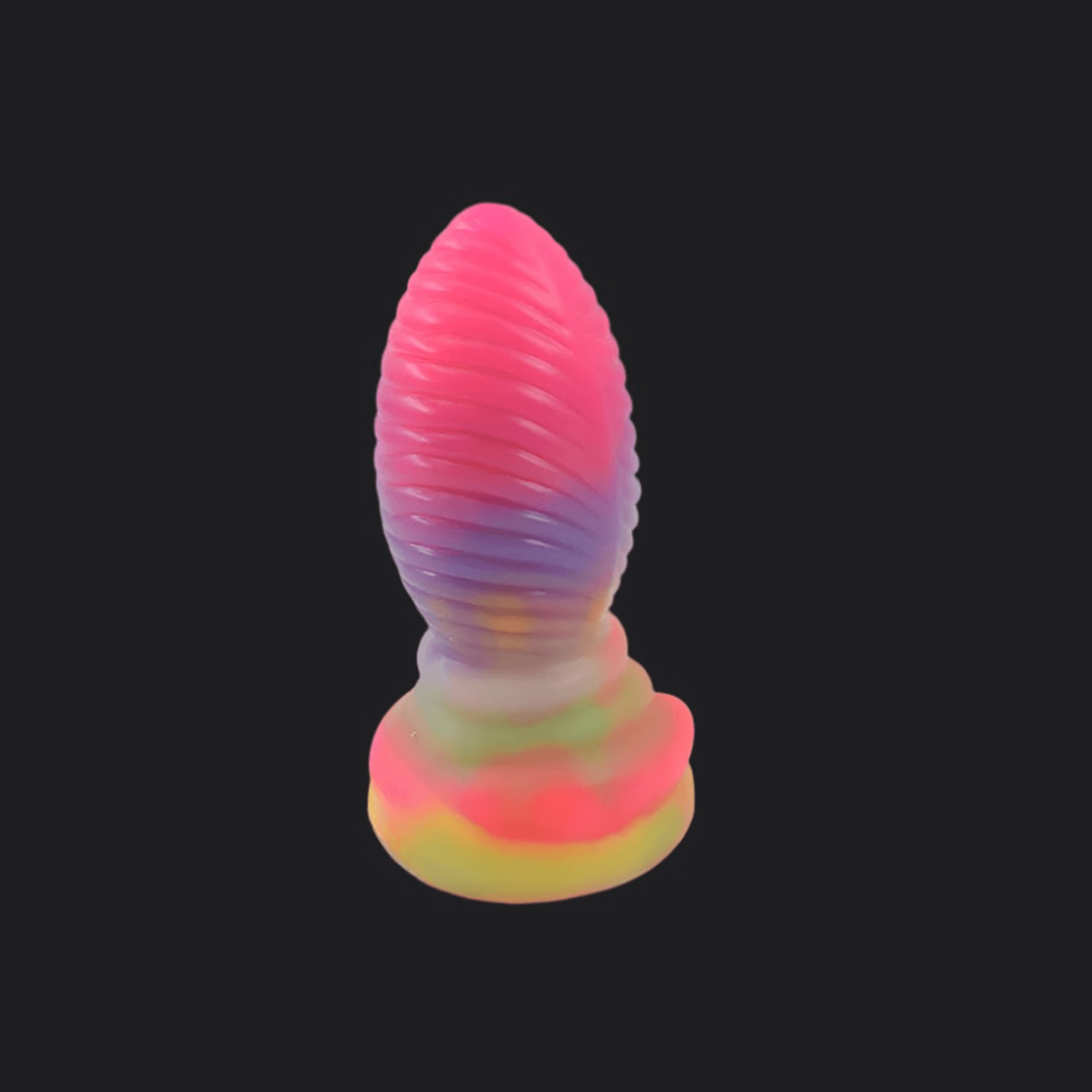 Iris Dragon Egg Plug made from premium silicone, featuring a colorful, spiraled design, 17 cm long and 14 cm wide.