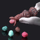 Unique Pandora Ovipositor alien dildo with colorful alien eggs, showcasing intergalactic fantasy and pleasure.