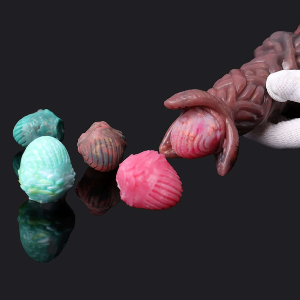 Pandora Ovipositor Alien Dildo with colorful alien eggs, showcasing sci-fi fantasy for unique sensations.
