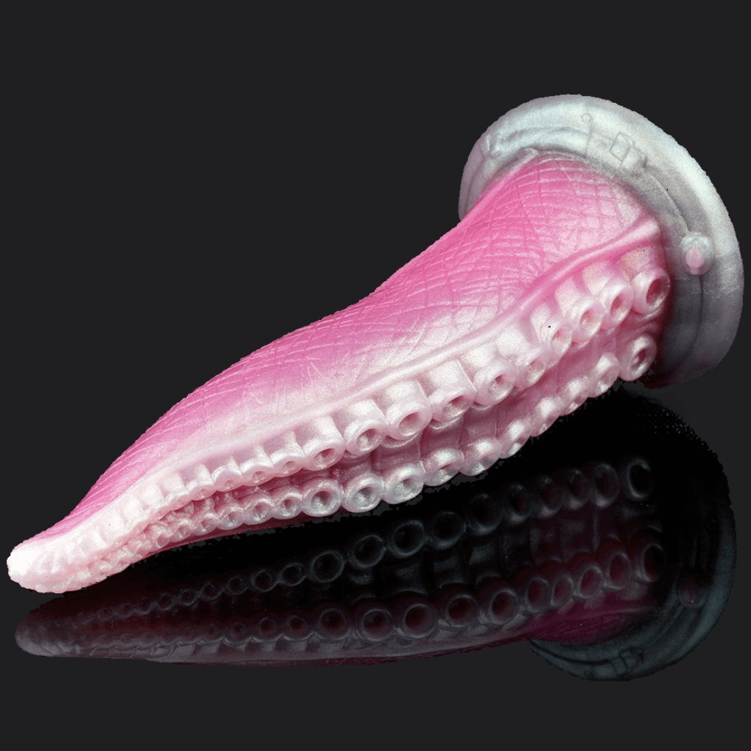 Pink octopus tentacle dildo with suction base for wild fantasies and blended orgasms.
