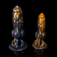 Am-heh monster dildo of the Ironmane Plains side by side -- Obsidian colourway -- hand-poured platinum silicone -- Dragon Dildo®
